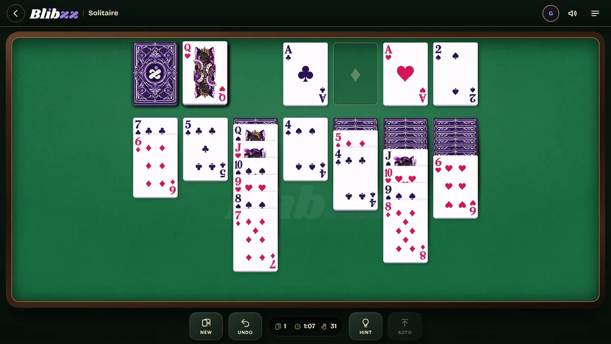 A Klondike game in progress with cards on the foundations and long runs in the columns
